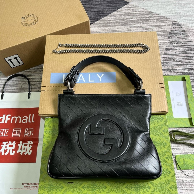G*u*i top handle bags